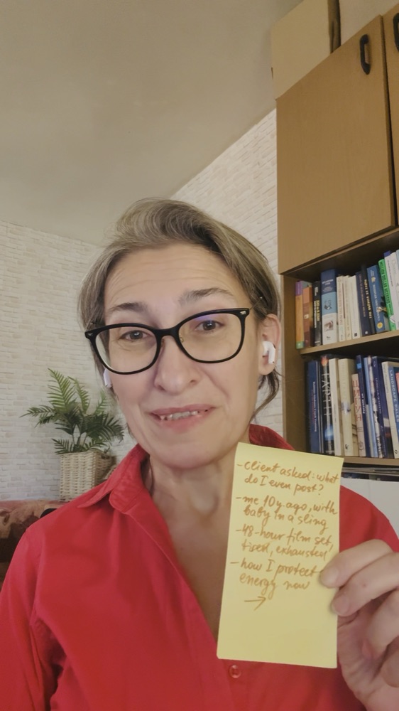 Iskra holding the sticky note her post started from